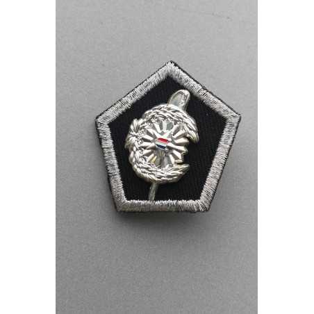 Combinatie metaal badge & geborduurde badges